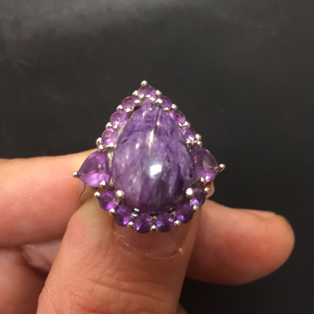 Purple charoite with amethyst around